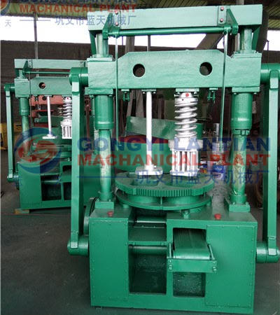 Charcoal briquette machine